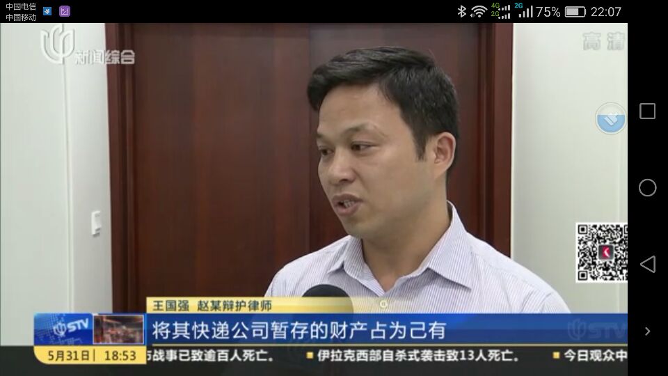 王国强律师正在就一刑事案件接受电视台采访-上海刑事律师